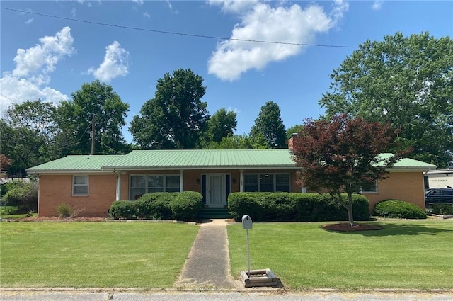 503 Skyline Dr, Harrison, AR 72601 - single story home with a front lawn, metal roof, and brick siding