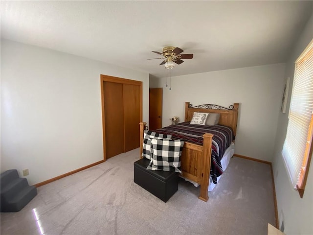 503 Skyline Dr, Harrison, AR 72601 - bedroom featuring baseboards, a closet, light colored carpet, and ceiling fan