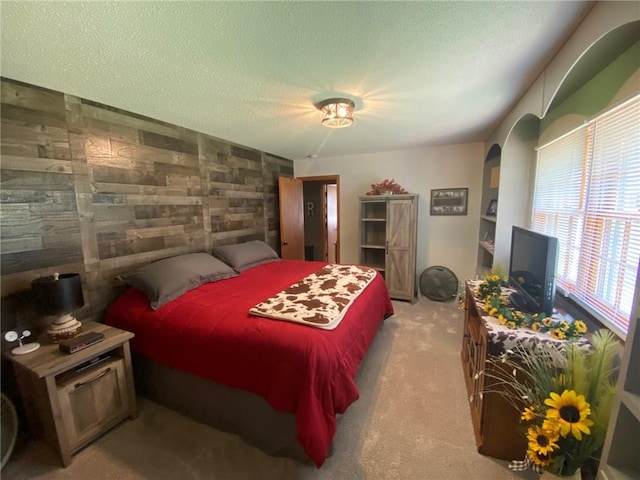 503 Skyline Dr, Harrison, AR 72601 - carpeted bedroom with a textured ceiling and wood walls