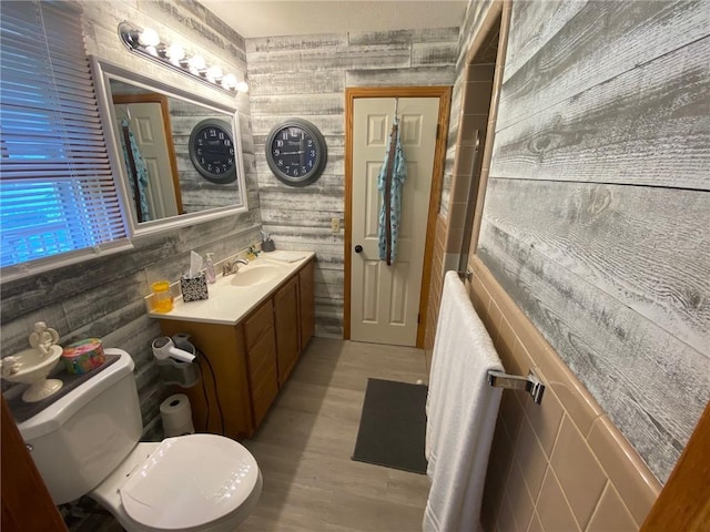 503 Skyline Dr, Harrison, AR 72601 - bathroom featuring vanity, toilet, and wood finished floors