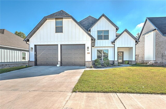1701 S 23rd Pl, Rogers, AR 72758 - modern inspired farmhouse with board and batten siding, driveway, a shingled roof, and a front lawn