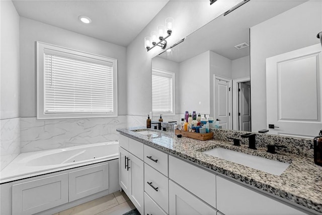 1701 S 23rd Pl, Rogers, AR 72758 - full bath featuring a sink, a whirlpool tub, double vanity, and visible vents
