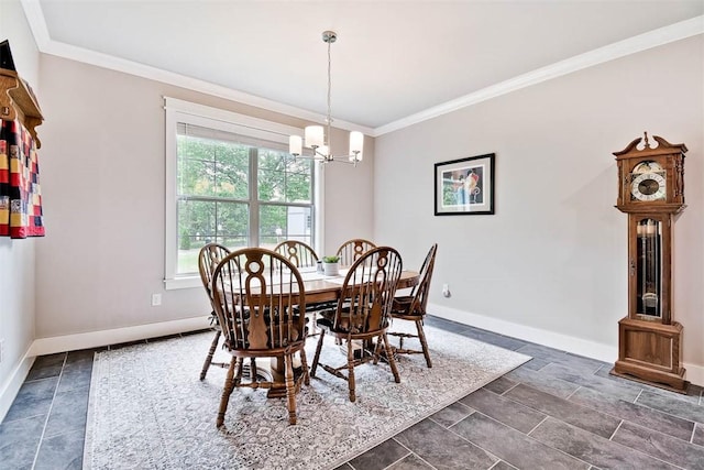 dining area featuring crown molding, baseboards, an inviting chandelier, and stone finish floor