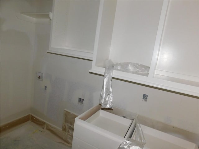 clothes washing area with laundry area and hookup for a washing machine