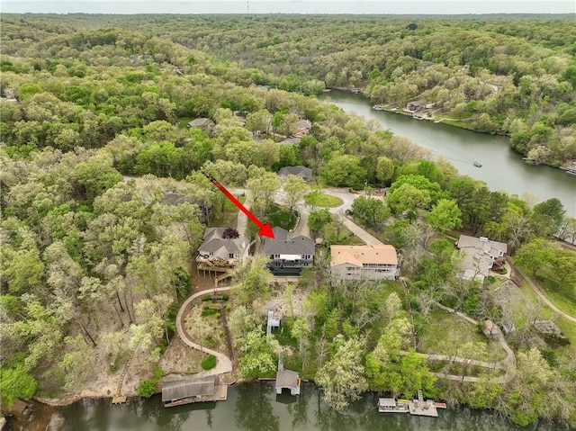 57 Dunsford Dr, Bella Vista, AR 72715 - aerial overview of property's location with a heavily wooded area and a large body of water
