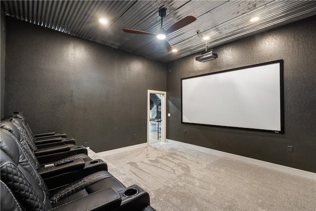 13248 N Old Wire Rd, Rogers, AR 72756 - carpeted cinema room featuring ceiling fan, a textured wall, and baseboards
