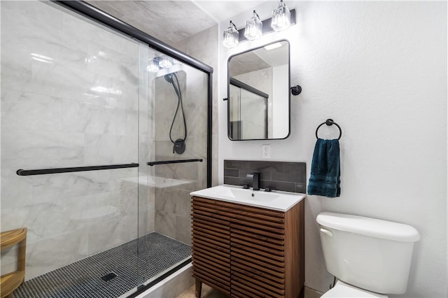 13248 N Old Wire Rd, Rogers, AR 72756 - full bath with toilet, a shower stall, vanity, and decorative backsplash