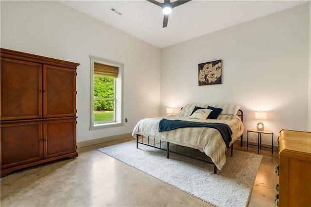 13248 N Old Wire Rd, Rogers, AR 72756 - bedroom with concrete flooring, baseboards, and ceiling fan