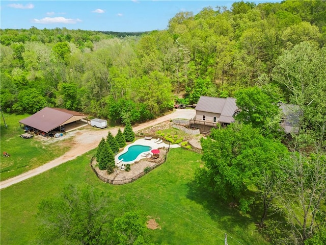 13248 N Old Wire Rd, Rogers, AR 72756 - aerial view of property and surrounding area featuring a heavily wooded area and a pool area