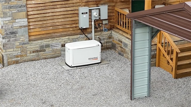 exterior details with electric meter and a power unit