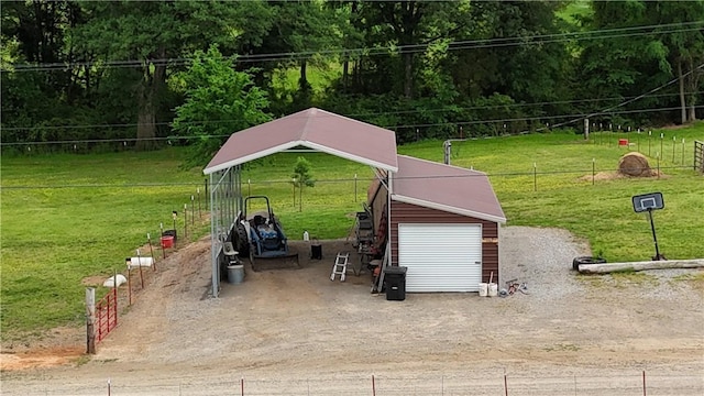 exterior space featuring fence and driveway