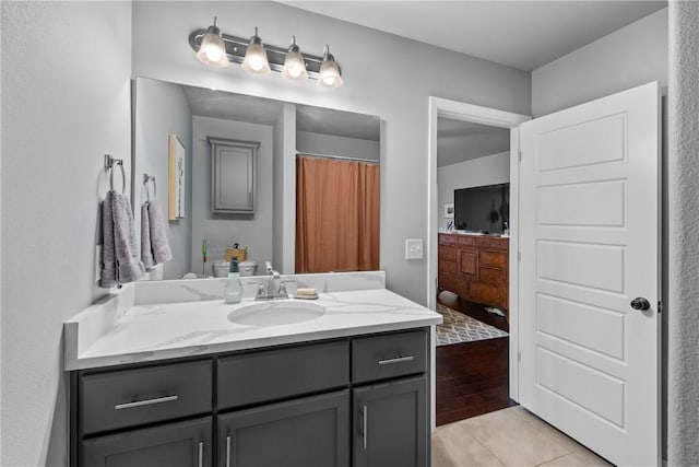 bathroom with vanity and tile patterned floors