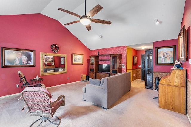 living area featuring a ceiling fan, high vaulted ceiling, and light colored carpet