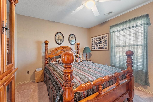 bedroom with carpet floors, baseboards, and a ceiling fan