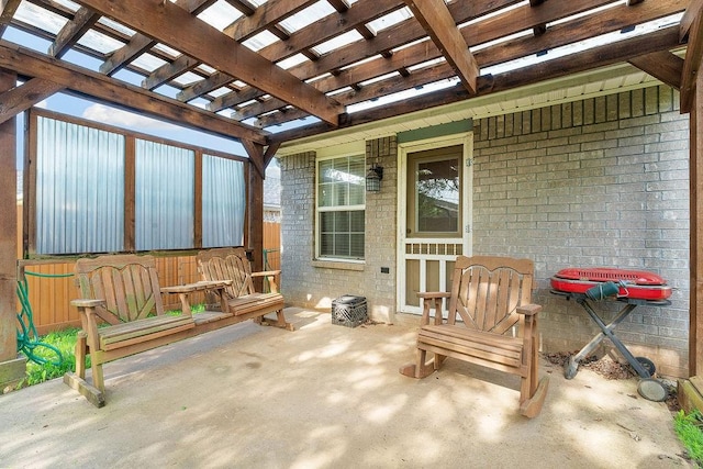 view of patio featuring a pergola