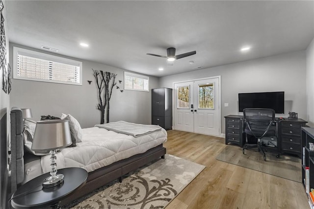 bedroom featuring recessed lighting, ceiling fan, visible vents, and light wood-style flooring