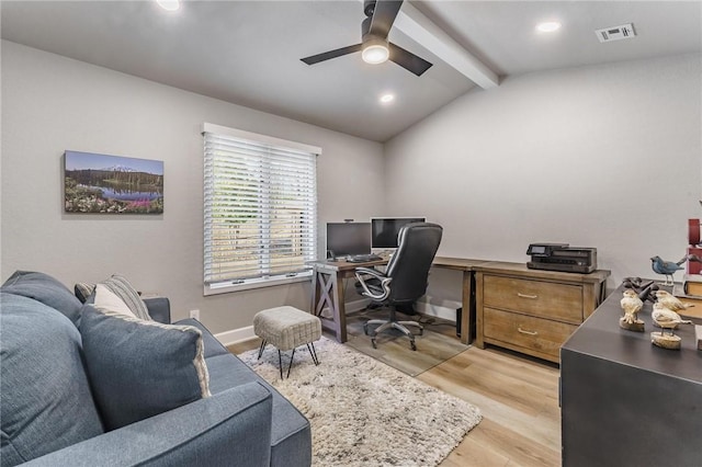 home office featuring ceiling fan, recessed lighting, vaulted ceiling with beams, light wood-type flooring, and visible vents