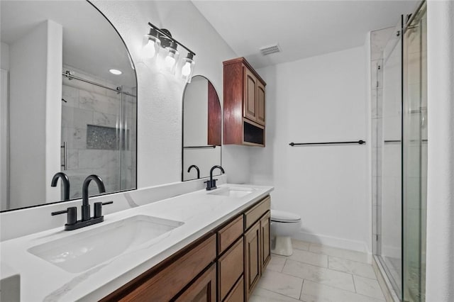full bath with visible vents, a shower stall, a sink, and marble finish floor