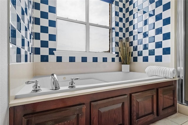 full bathroom with a bath