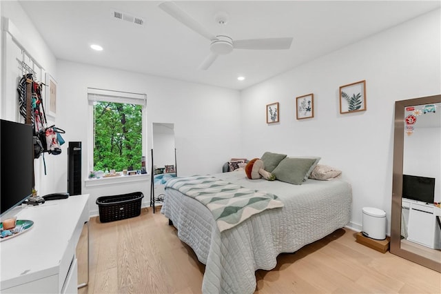 bedroom with recessed lighting, ceiling fan, light wood-type flooring, and visible vents