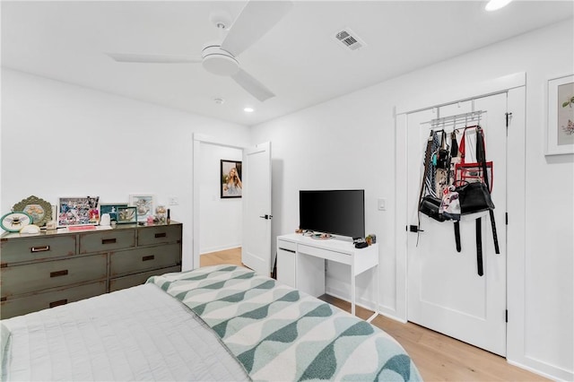 bedroom featuring recessed lighting, ceiling fan, light wood finished floors, and visible vents