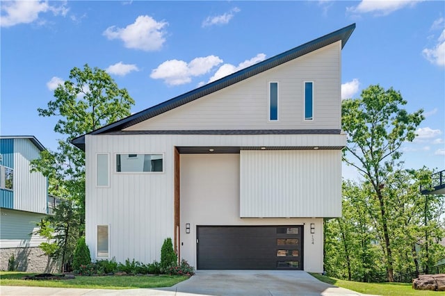 exterior space with a garage and driveway