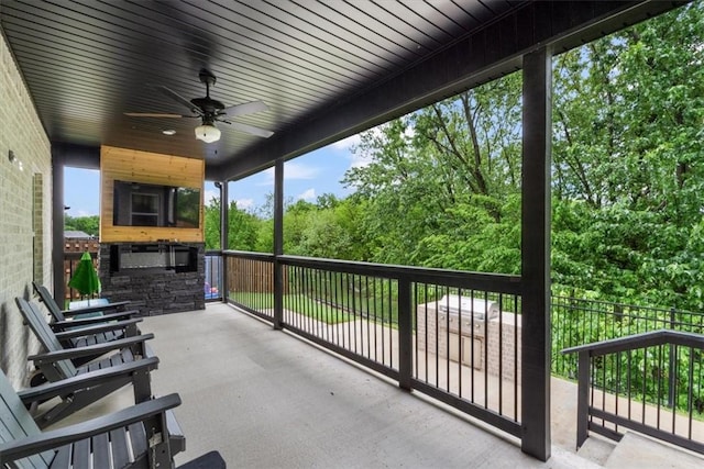 view of patio / terrace featuring a ceiling fan