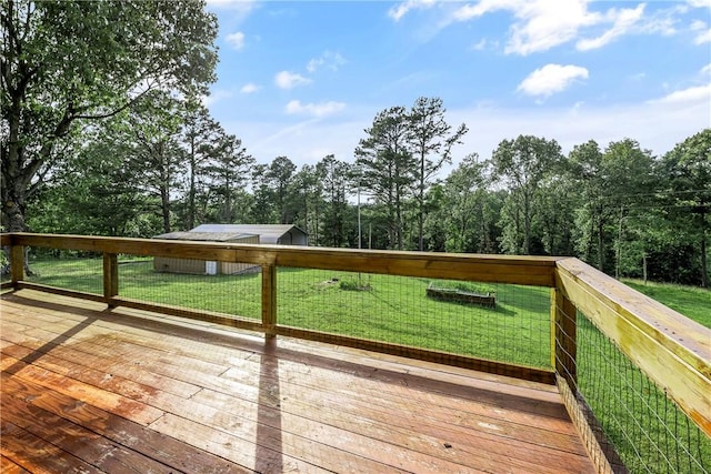 deck featuring a yard