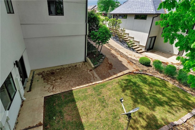 view of yard with stairway