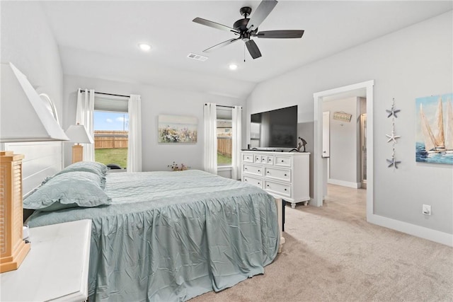 bedroom with ceiling fan, light carpet, baseboards, lofted ceiling, and visible vents
