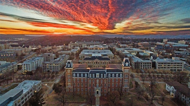 aerial view at dusk with a city view