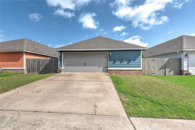 exterior space featuring a shingled roof, fence, and a yard
