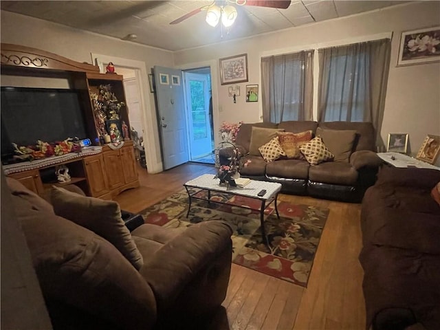 607 Carter St, Clarksville, AR 72830 - living room featuring ceiling fan and wood finished floors
