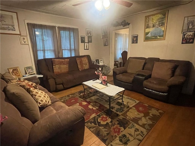 607 Carter St, Clarksville, AR 72830 - living room featuring a ceiling fan and wood finished floors