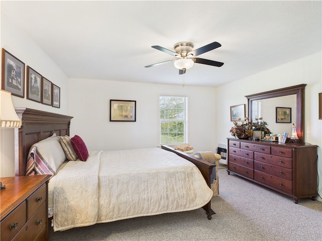 bedroom with carpet flooring and a ceiling fan