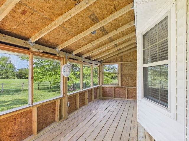 unfurnished sunroom with plenty of natural light