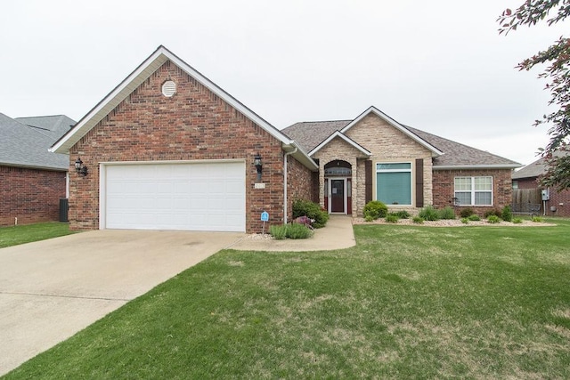 203 W Hayden Blvd, Rogers, AR 72756 - view of front of property featuring a front yard, brick siding, driveway, and a garage