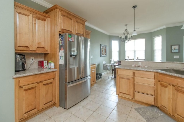 203 W Hayden Blvd, Rogers, AR 72756 - kitchen with stainless steel refrigerator with ice dispenser, light tile patterned floors, a chandelier, crown molding, and tasteful backsplash