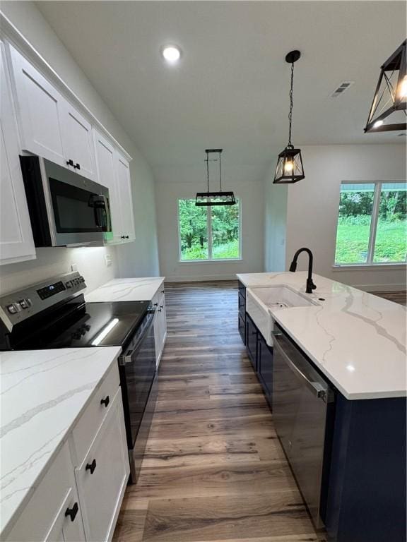 13537 Little Elm Rd, Farmington, AR 72730 - kitchen featuring appliances with stainless steel finishes, white cabinetry, plenty of natural light, a sink, and recessed lighting
