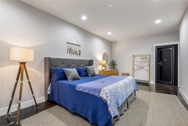 bedroom featuring recessed lighting, baseboards, and wood finished floors