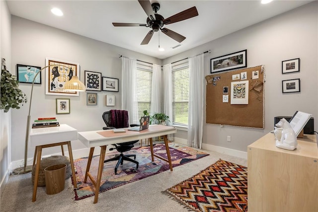 office area featuring carpet flooring, a ceiling fan, baseboards, recessed lighting, and visible vents