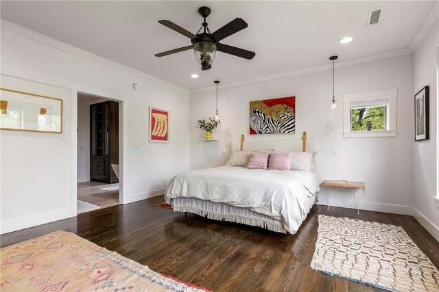 bedroom featuring crown molding, recessed lighting, baseboards, wood finished floors, and visible vents