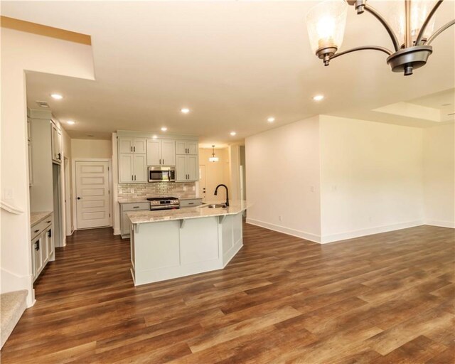 kitchen featuring recessed lighting, a sink, and stainless steel appliances