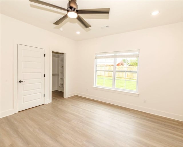 212 Nebo St, Prairie Grove, AR 72753 - unfurnished bedroom featuring light wood-style flooring, baseboards, and recessed lighting