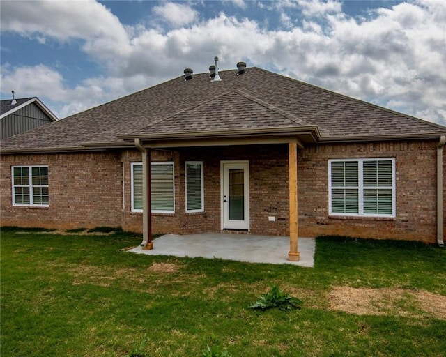 212 Nebo St, Prairie Grove, AR 72753 - rear view of property with a yard, a patio area, brick siding, and a shingled roof