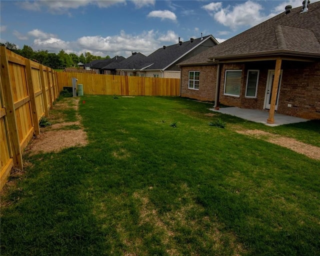 212 Nebo St, Prairie Grove, AR 72753 - view of yard featuring a fenced backyard and a patio