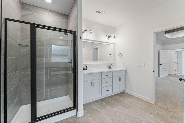 909 Budrio Ave, Tontitown, AR 72762 - full bathroom with a stall shower, double vanity, and baseboards