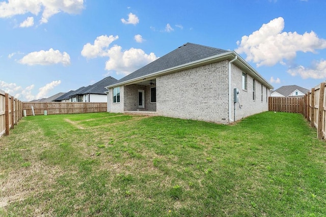 909 Budrio Ave, Tontitown, AR 72762 - back of house with brick siding
