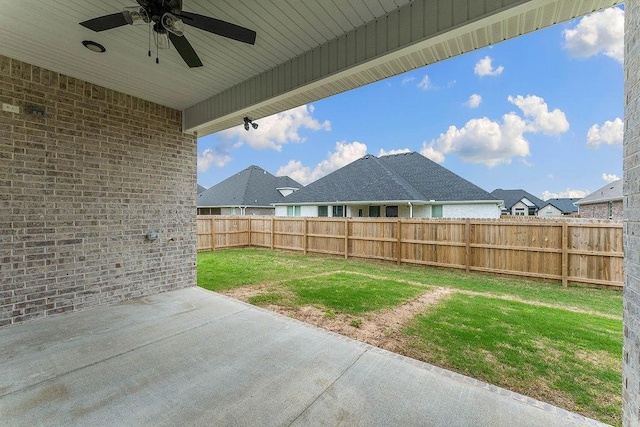 909 Budrio Ave, Tontitown, AR 72762 - view of yard featuring a patio and ceiling fan