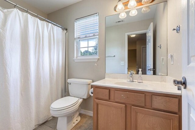 5213 S 62nd St, Rogers, AR 72758 - full bathroom featuring toilet, vanity, baseboards, tile patterned flooring, and curtained shower